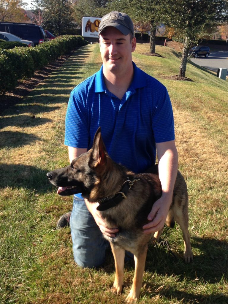 MWD Matty and Specialist Brent Grommet. Image source: American Humane Association