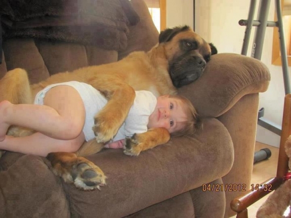 Every kid needs a dog to cuddle and watch TV with!