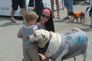 Bringing the family to make sure you choose a dog that everyone likes and that fits your lifestyle. Image source: USAG-Humphreys via Flickr 