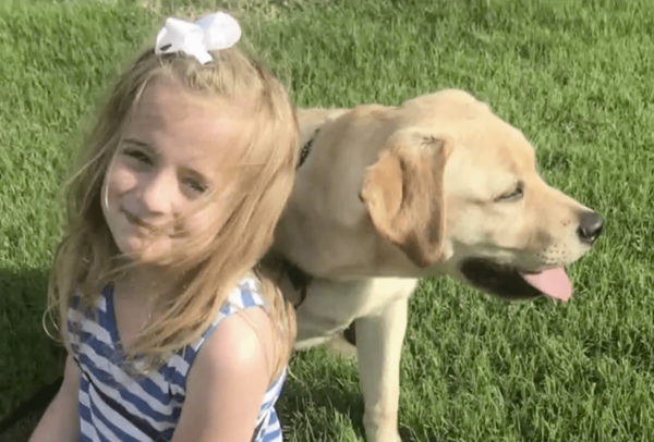 Girl with Labrador Retriever