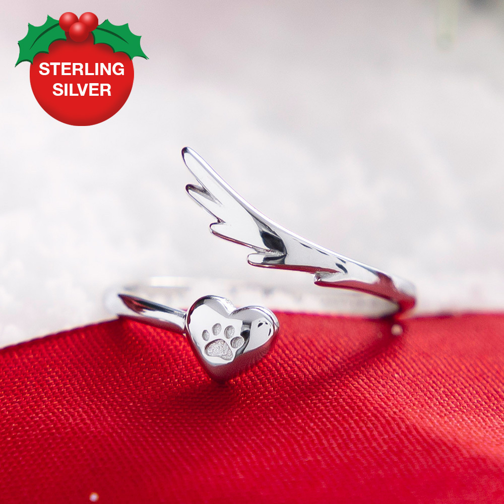 Image of A Christmas Miracle Angel Wings Sterling Silver Ring (Feed 30 Shelter Dogs)