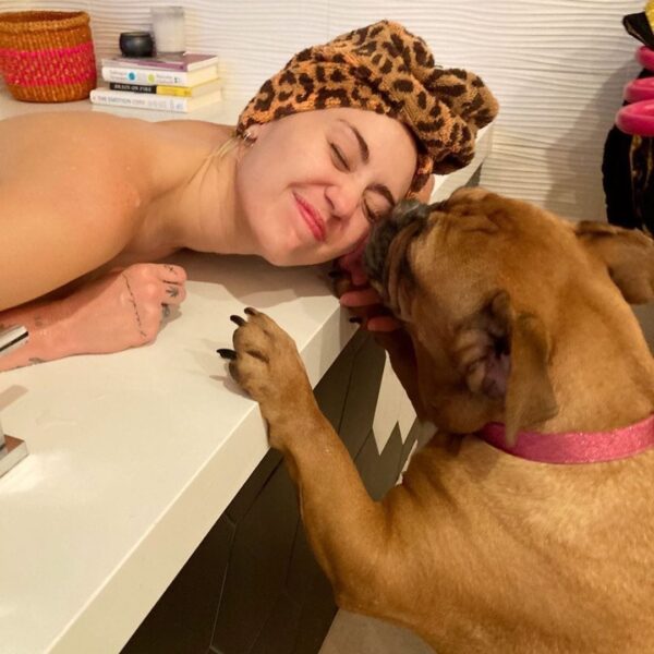 Miley Cyrus Dog Kisses