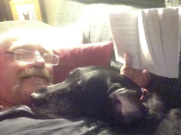 Man and Dog Reading