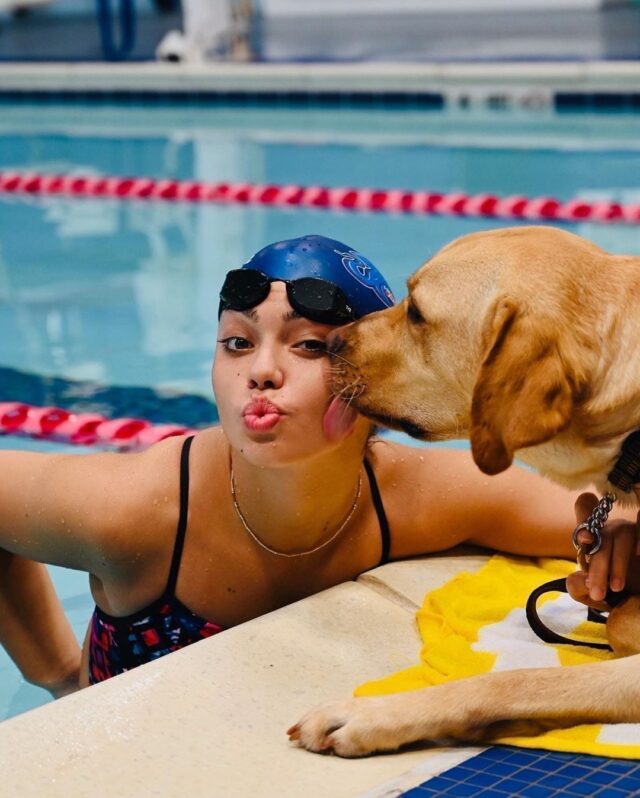 Service Dog Kisses Human at Pool