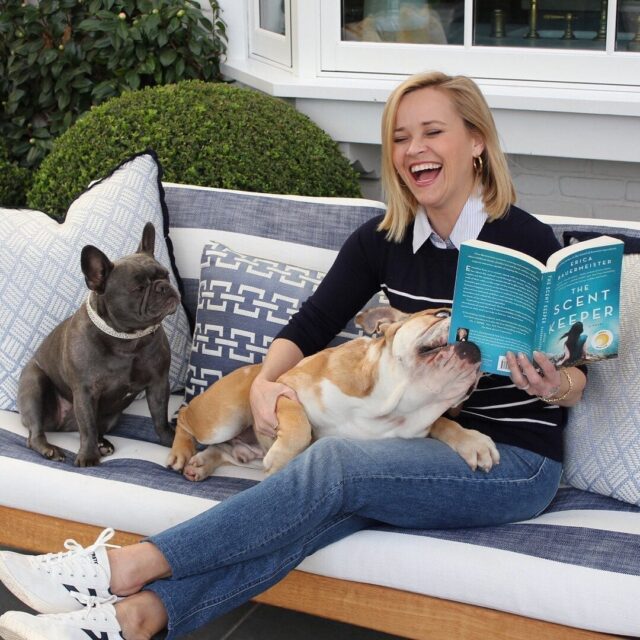 Reese Witherspoon Reading with Dogs