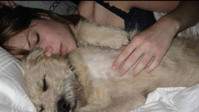 Mandy Moore Cuddling Dog