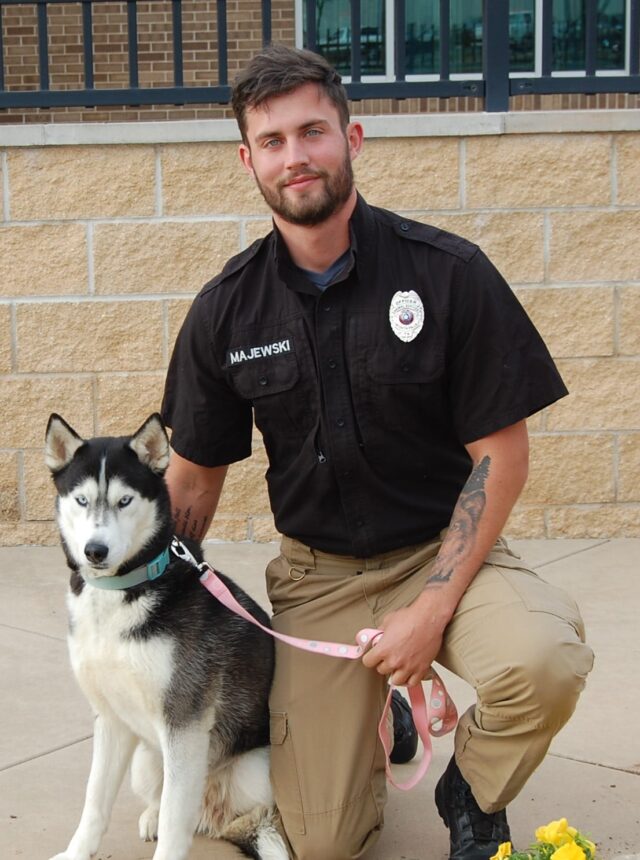 Hot Shelter Employee and Husky