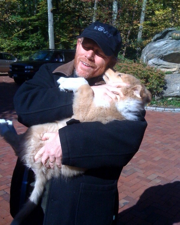 Ron Howard cuddling puppy