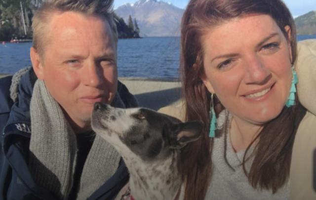 Couple traveling with rescue dog