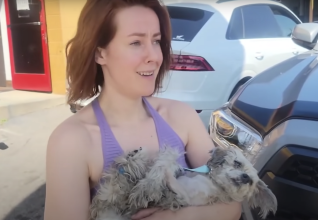 Jena Malone holding dog