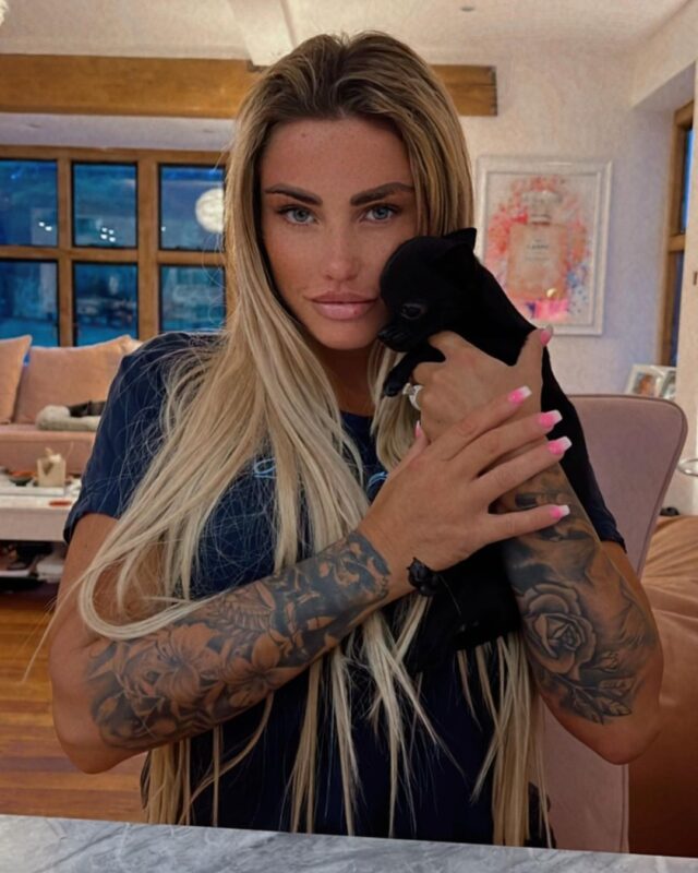 Katie Price holding puppy