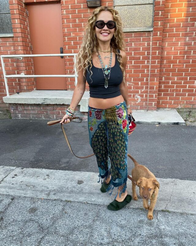 Rita Ora walking puppy