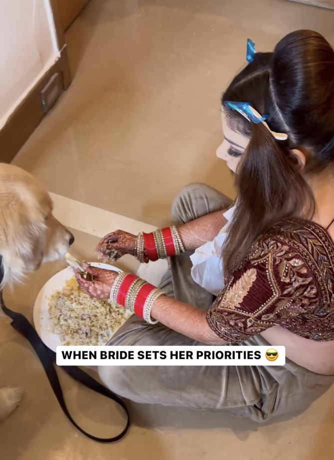 Bride spending time with dog
