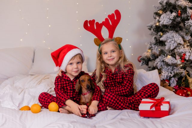 Kids and dog in pajamas