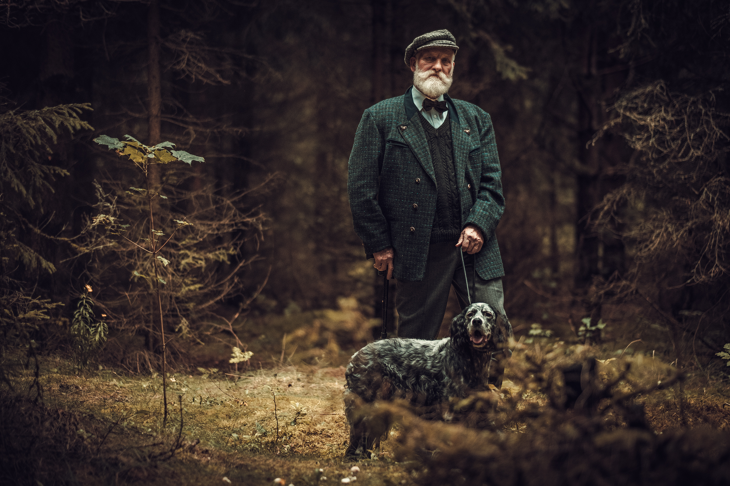 Senior,Man,With,Dog,In,A,Traditional,Shooting,Clothing,On